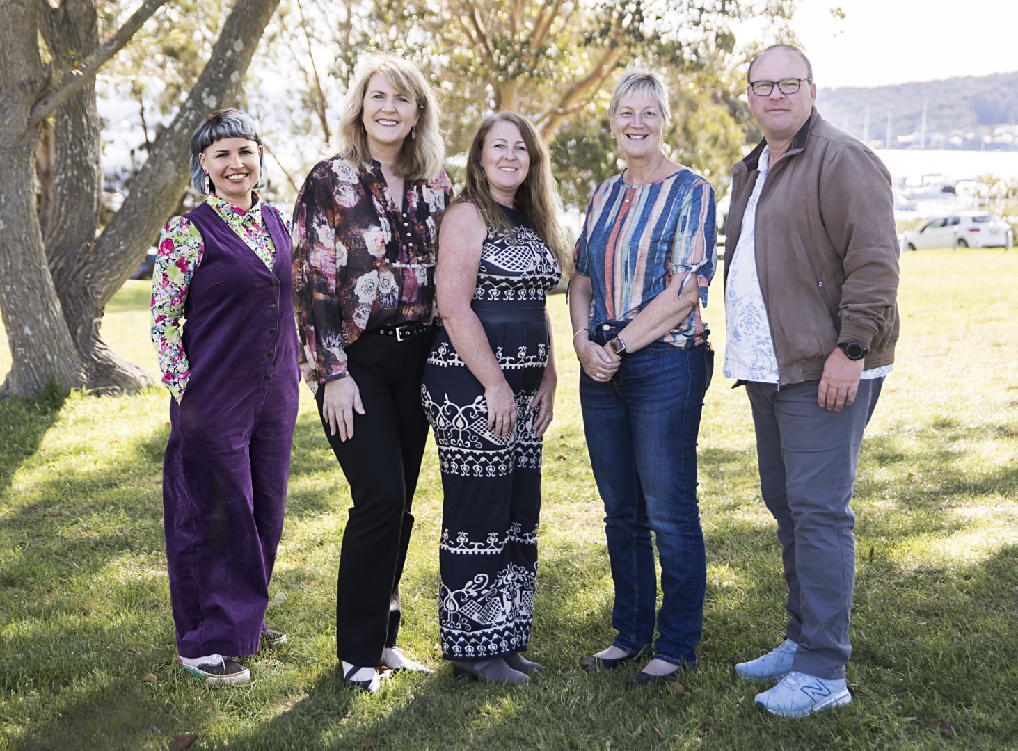 Group photograph of adults standing together as a support coordination team