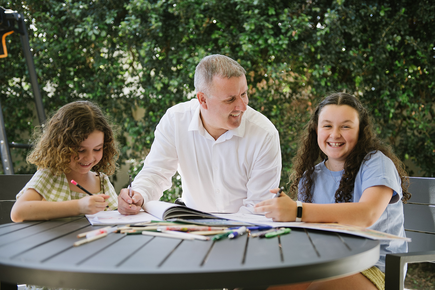 Photograph illustrating a behaviour support practitioner in a support setting