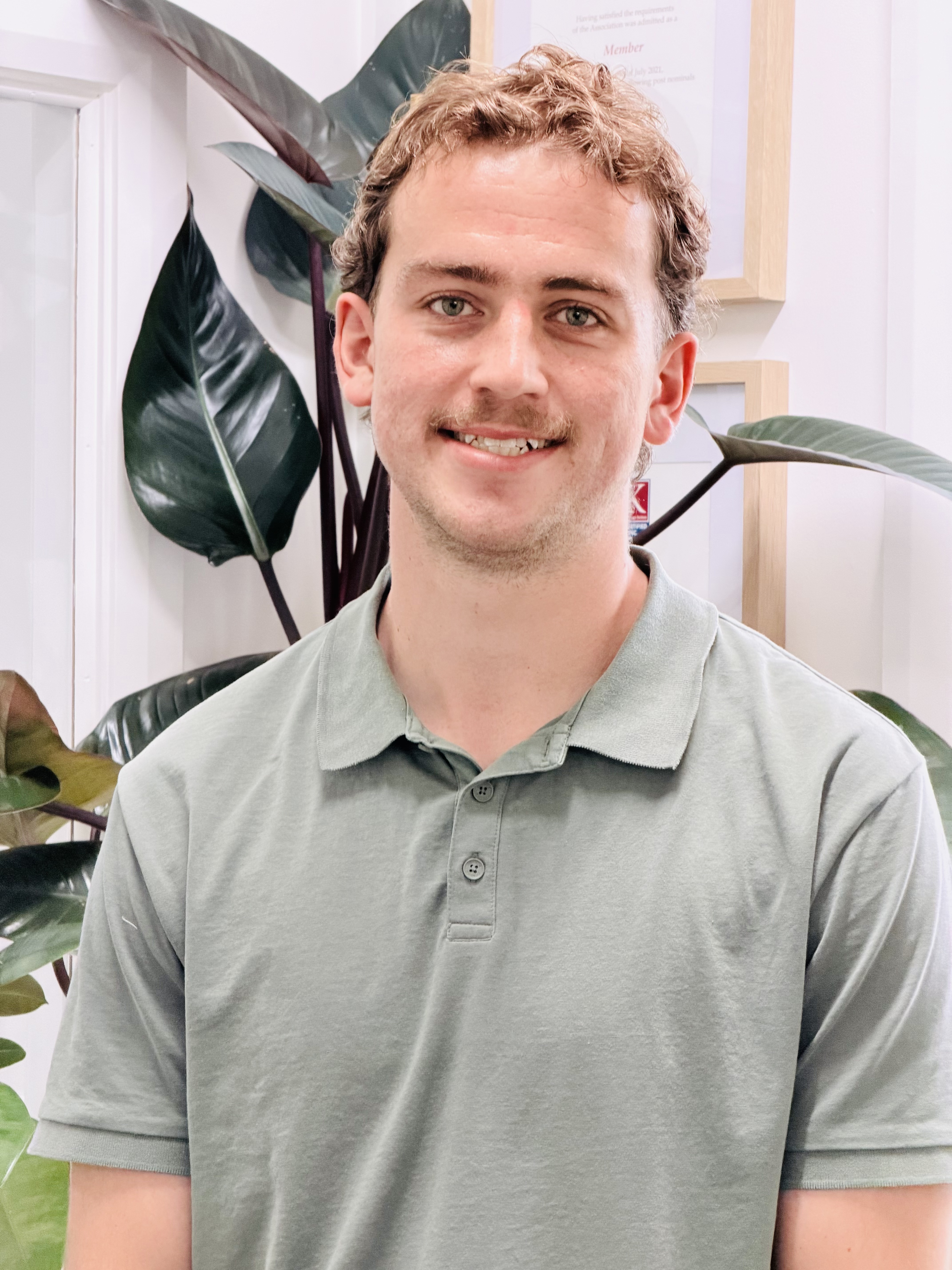 Portrait photograph of a team member in a clinical lead behaviour support role